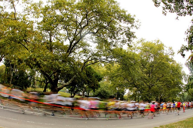 Runners pass by in a blur during a 2013 half marathon in New York's Central Park. (Photo by Phil Roeder/flickr)