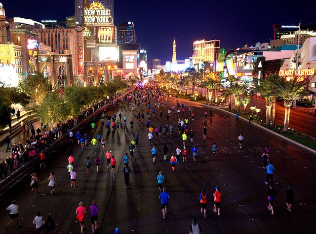 Runners make their way down the Las Vegas Strip at the 2014 Rock 'n' Roll Las Vegas Marathon & Half Marathon. (Photo by Travis Wise/flickr)