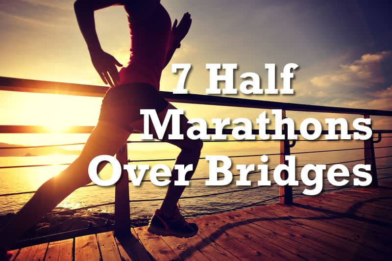 Silhouetted runner on a wooden boardwalk by the water at sunset with the text "7 Half Marathons Over Bridges" overlaying the image.