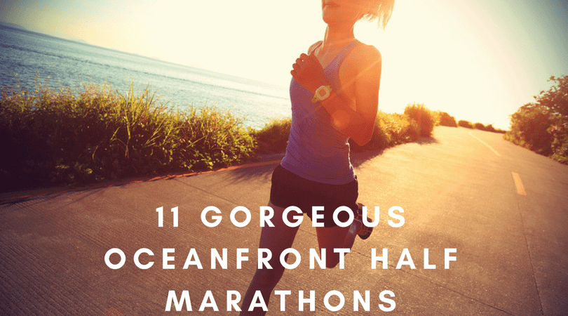 A person jogging on a paved path near the ocean, with the sun setting in the background. The text overlay reads: "11 Gorgeous Oceanfront Half Marathons.”.