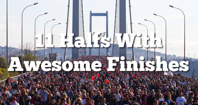 A large crowd of runners is crossing a bridge during a race. The text overlay reads, "11 Halfs With Awesome Finishes." The bridge structure and numerous participants create a sense of enthusiasm and large-scale participation in the event.