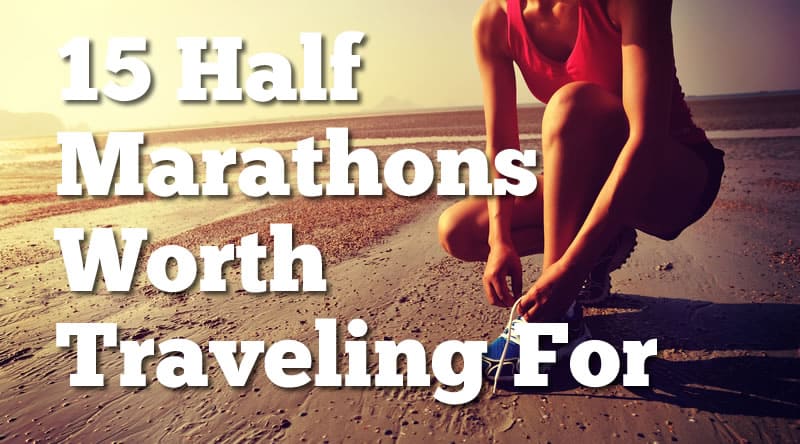 A person in athletic attire ties their shoe on a sandy beach with text overlay reading "15 Half Marathons Worth Traveling For.