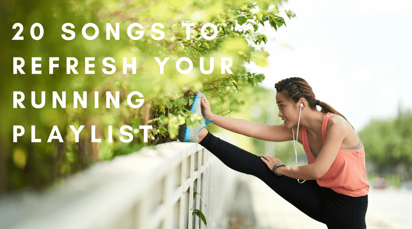 A woman in athletic wear is stretching her leg on a fence outdoors, her headphones plugged in. The text "20 Songs to Refresh Your Running Playlist" is displayed on the left side of the image. The background features greenery.