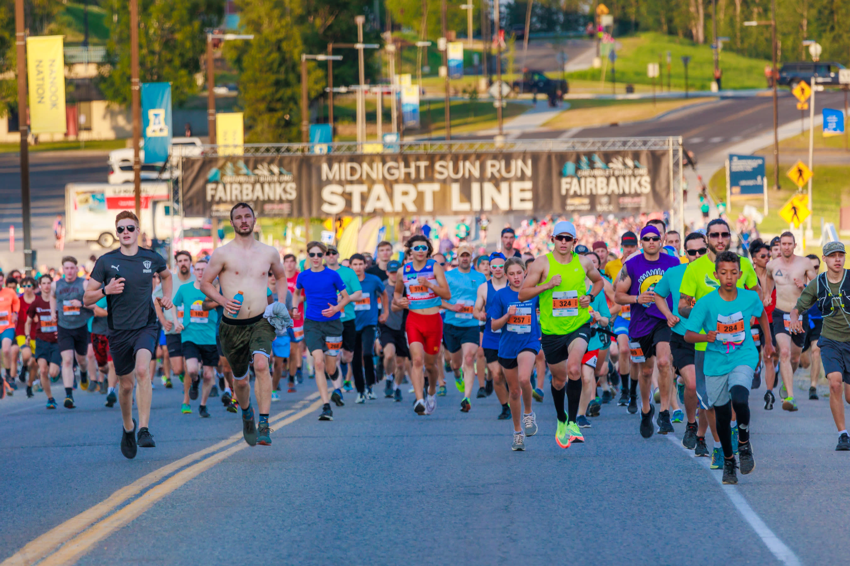 Runners at the starting line of the Fairbanks Midnight Sun Run 