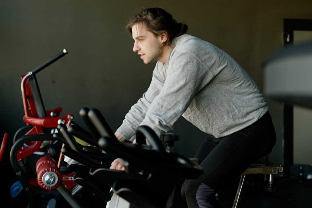 an athlete cross-training on an indoor bike